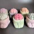 seconds Brainy Doll Head candle